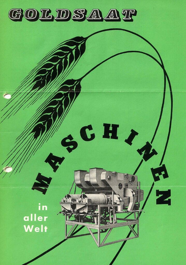 Historisches Plakat „Goldsaat Maschinen in aller Welt“ mit einer großen Getreidezeichnung und einer Reinigungsmaschine auf grünem Hintergrund.